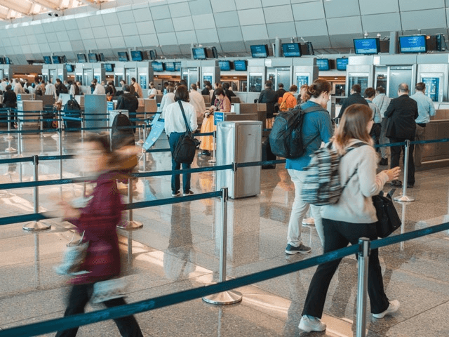 Airport terminal with biometric passenger processing